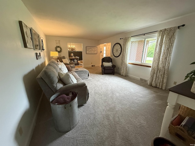 5522 N State Rd 57, Petersburg, IN 47567 - carpeted living area with baseboards and a chandelier