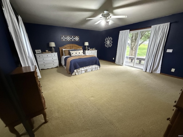 5522 N State Rd 57, Petersburg, IN 47567 - carpeted bedroom featuring access to outside, baseboards, and ceiling fan