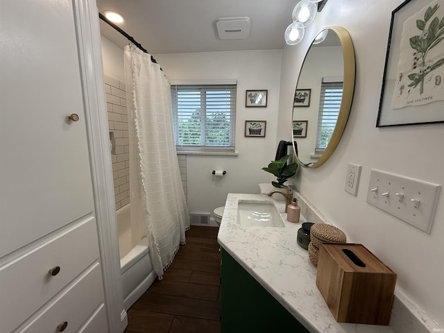 5522 N State Rd 57, Petersburg, IN 47567 - full bathroom featuring vanity, toilet, wood finished floors, and shower / bath combo with shower curtain