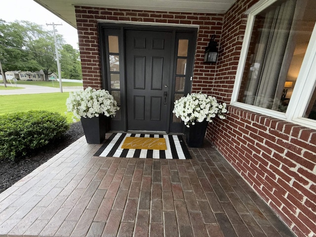 5522 N State Rd 57, Petersburg, IN 47567 - doorway to property with brick siding and a porch