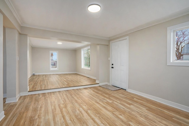 608 W Polywood Way, Syracuse, IN 46567 - empty room featuring light wood-type flooring, baseboards, and ornamental molding