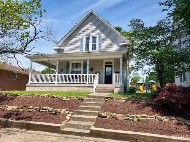 306 E 8th St, Jasper, IN 47546 - view of front of property featuring covered porch