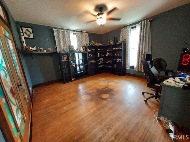 306 E 8th St, Jasper, IN 47546 - home office featuring wood finished floors and ceiling fan