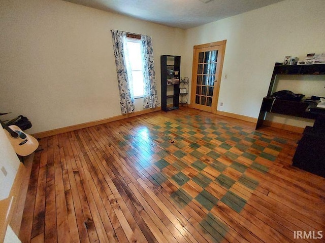306 E 8th St, Jasper, IN 47546 - spare room featuring hardwood / wood-style floors and baseboards