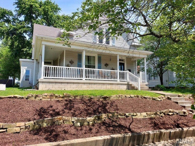 306 E 8th St, Jasper, IN 47546 - country-style home with covered porch
