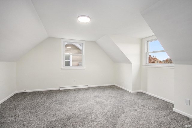 718 W 8th St, Mishawaka, IN 46544 - bonus room with a baseboard heating unit, carpet floors, vaulted ceiling, and baseboards