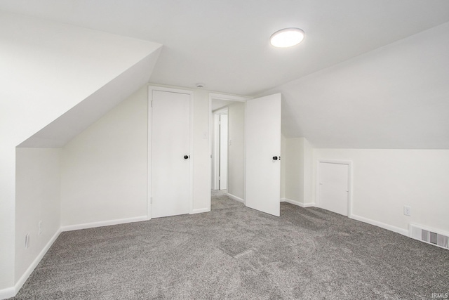 718 W 8th St, Mishawaka, IN 46544 - additional living space featuring carpet floors, lofted ceiling, and baseboards