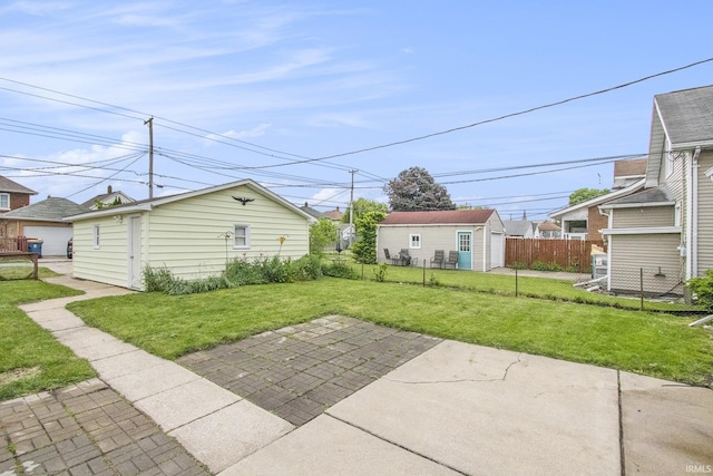 718 W 8th St, Mishawaka, IN 46544 - view of patio / terrace featuring an outbuilding