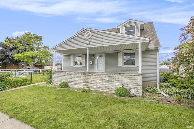 718 W 8th St, Mishawaka, IN 46544 - view of front of home with roof with shingles and covered porch