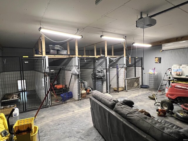 2940 N Stanford Woods Dr, Solsberry, IN 47459 - garage with a garage door opener and an AC wall unit