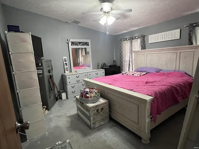 2940 N Stanford Woods Dr, Solsberry, IN 47459 - bedroom featuring a textured ceiling, concrete floors, and a ceiling fan