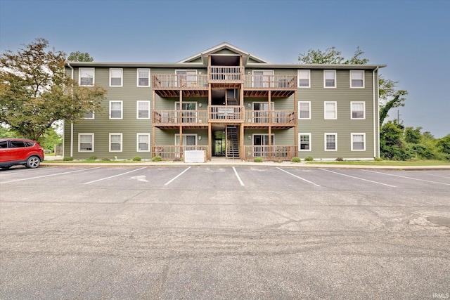 3220 E John Hinkle Pl Unit F, Bloomington, IN 47408 - view of property with uncovered parking