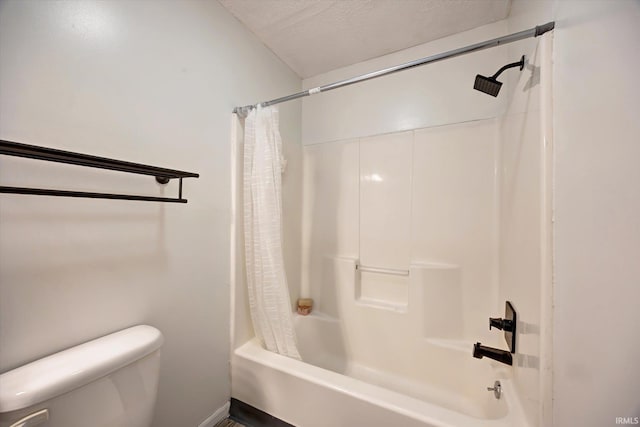 3220 E John Hinkle Pl Unit F, Bloomington, IN 47408 - full bathroom featuring shower / tub combo with curtain, toilet, and a textured ceiling