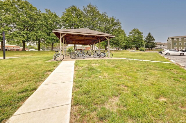 3220 E John Hinkle Pl Unit F, Bloomington, IN 47408 - view of grassy yard with a gazebo