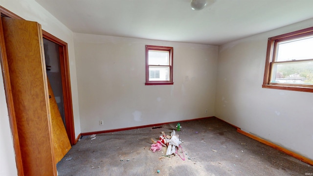 736 N 13th St, Elwood, IN 46036 - empty room with baseboards and carpet