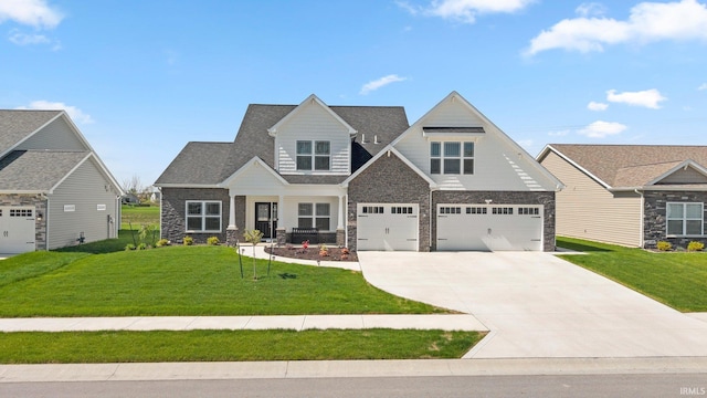 13909 Stone Table Blvd, Fort Wayne, IN 46845 - craftsman-style house featuring stone siding, driveway, a front lawn, and a garage