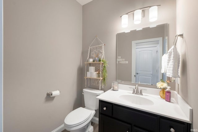 13909 Stone Table Blvd, Fort Wayne, IN 46845 - half bath with toilet, vanity, and baseboards