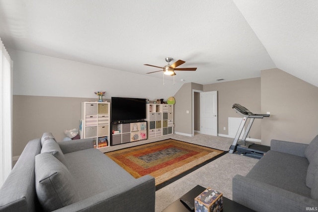 13909 Stone Table Blvd, Fort Wayne, IN 46845 - carpeted living room with vaulted ceiling, ceiling fan, and baseboards