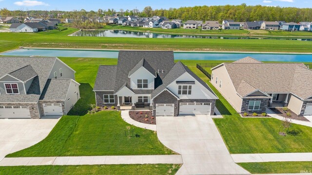 13909 Stone Table Blvd, Fort Wayne, IN 46845 - aerial perspective of suburban area with a nearby body of water