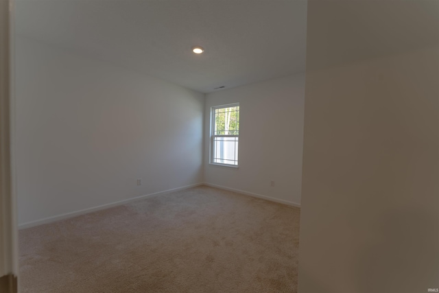 1208 Mount Isa Pl, Fort Wayne, IN 46845 - spare room featuring baseboards, light carpet, and recessed lighting