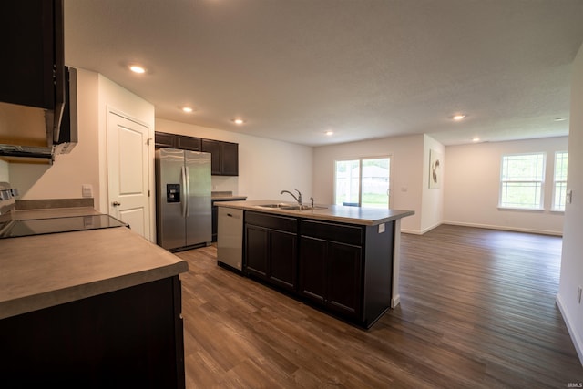 1208 Mount Isa Pl, Fort Wayne, IN 46845 - kitchen with appliances with stainless steel finishes, a sink, dark wood-style flooring, a center island with sink, and recessed lighting
