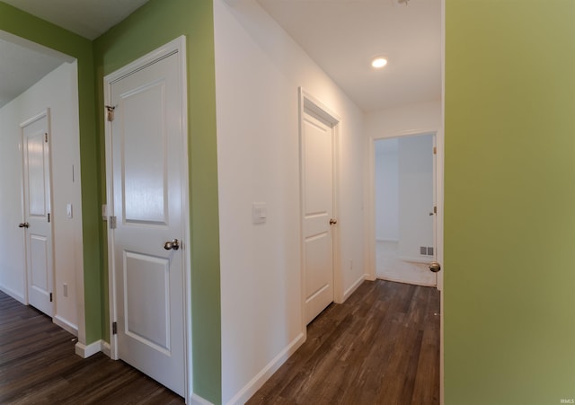 1208 Mount Isa Pl, Fort Wayne, IN 46845 - hallway featuring dark wood-style flooring, baseboards, and recessed lighting
