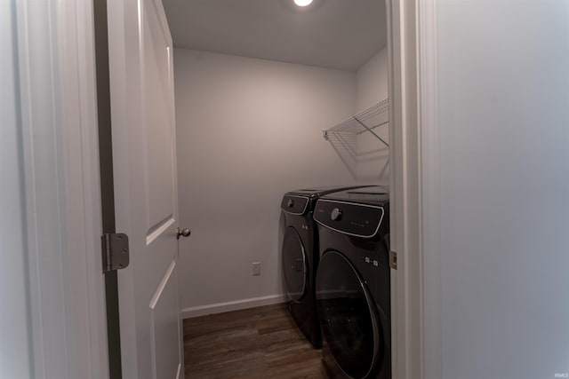 1208 Mount Isa Pl, Fort Wayne, IN 46845 - washroom featuring washer and clothes dryer, dark wood-style floors, and baseboards