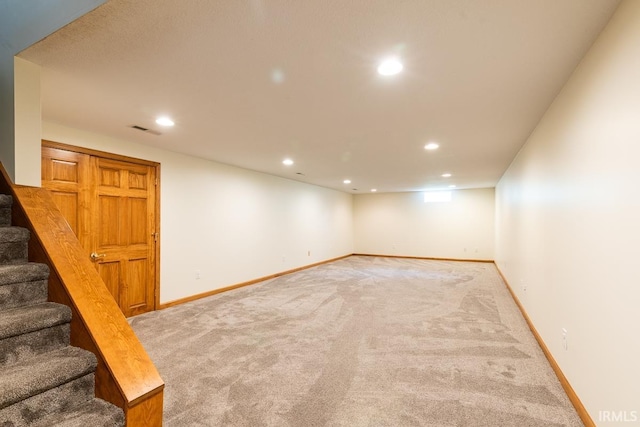 7819 Greenwell Rd, Churubusco, IN 46723 - finished below grade area with stairway, light carpet, recessed lighting, and baseboards