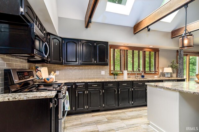 7819 Greenwell Rd, Churubusco, IN 46723 - kitchen featuring stainless steel range with electric stovetop, a skylight, dark cabinets, beamed ceiling, and a sink