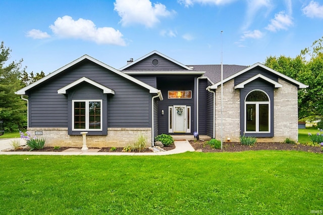 611 Big Valley Ct, Huntertown, IN 46748 - view of front of house with a front yard and brick siding