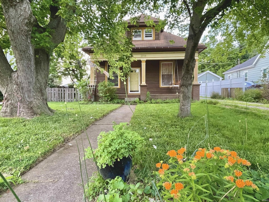 2016 Vogel Rd, Evansville, IN 47711 - bungalow with covered porch and a shingled roof