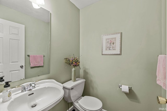 51062 Oak Hollow Ln, South Bend, IN 46628 - bathroom with a sink and toilet