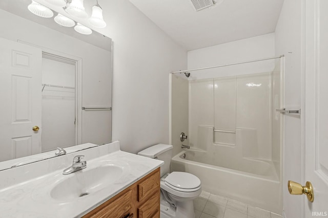 51062 Oak Hollow Ln, South Bend, IN 46628 - full bath featuring toilet, tile patterned floors, vanity, and bathing tub / shower combination