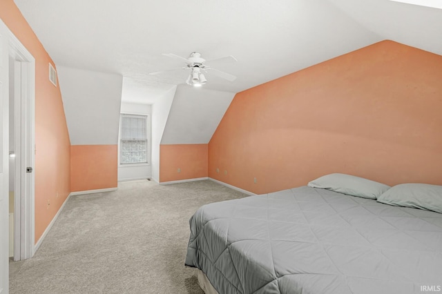 51062 Oak Hollow Ln, South Bend, IN 46628 - bedroom with vaulted ceiling, carpet, baseboards, and ceiling fan