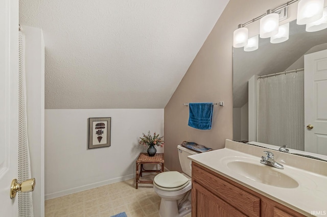 51062 Oak Hollow Ln, South Bend, IN 46628 - full bath with lofted ceiling, toilet, vanity, and baseboards