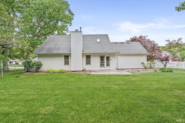 51062 Oak Hollow Ln, South Bend, IN 46628 - rear view of property featuring a patio, a chimney, and a shingled roof
