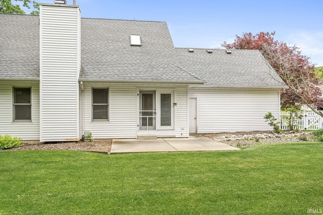 51062 Oak Hollow Ln, South Bend, IN 46628 - back of property with a shingled roof, a lawn, a patio, and a chimney