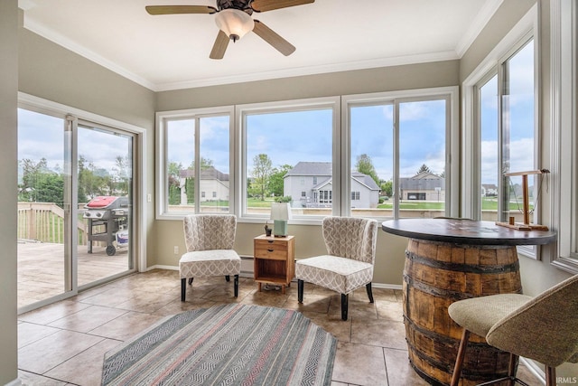 51405 Amesburry Way, Granger, IN 46530 - sunroom / solarium with tile patterned flooring, ornamental molding, baseboards, and a baseboard heating unit