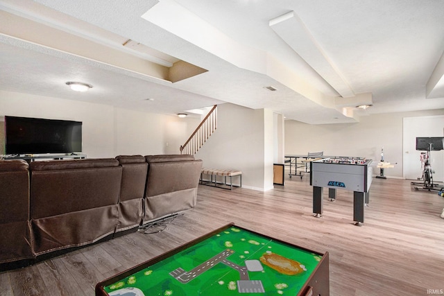 51405 Amesburry Way, Granger, IN 46530 - game room featuring wood finished floors and baseboards