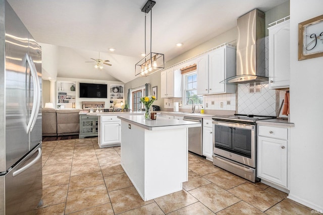 51405 Amesburry Way, Granger, IN 46530 - kitchen with stainless steel appliances, wall chimney range hood, open floor plan, decorative backsplash, and a ceiling fan
