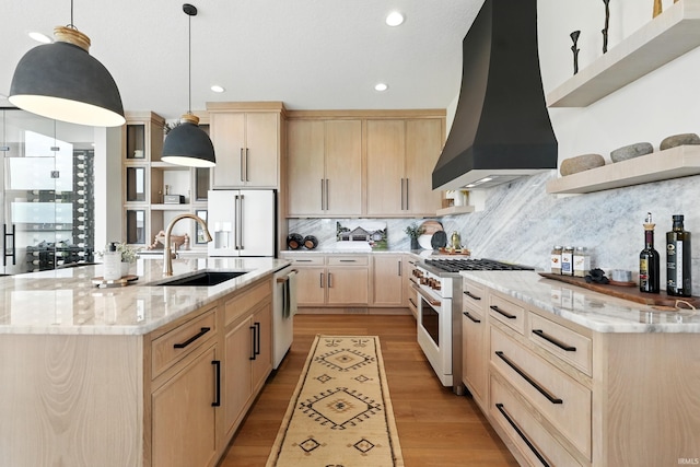 17807 Milazzo Cv, Huntertown, IN 46748 - kitchen featuring light brown cabinets, premium appliances, custom range hood, open shelves, and a sink