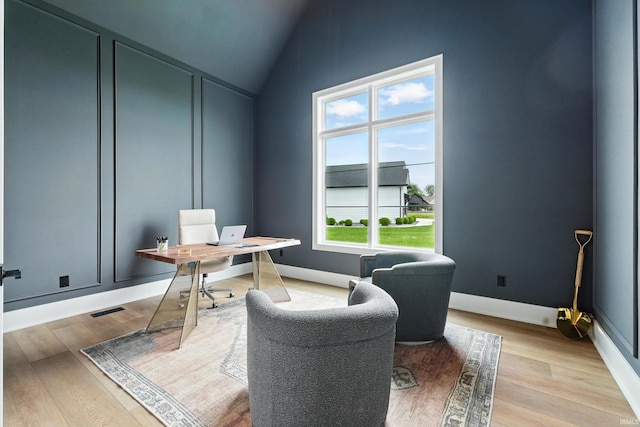 17807 Milazzo Cv, Huntertown, IN 46748 - home office featuring light wood-style floors and lofted ceiling
