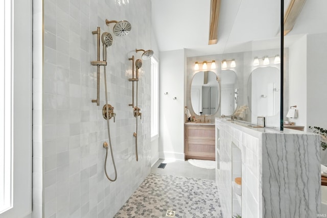 17807 Milazzo Cv, Huntertown, IN 46748 - bathroom featuring a tile shower and vanity