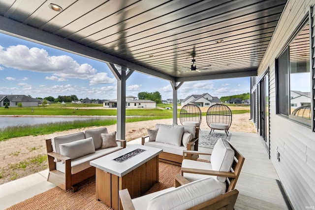 17807 Milazzo Cv, Huntertown, IN 46748 - view of patio with an outdoor living space with a fire pit and a water view
