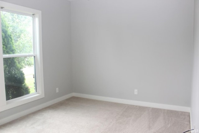 5110 Mustang Dr, Evansville, IN 47715 - empty room with light colored carpet and baseboards