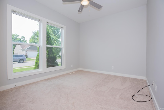5110 Mustang Dr, Evansville, IN 47715 - carpeted spare room with ceiling fan and baseboards