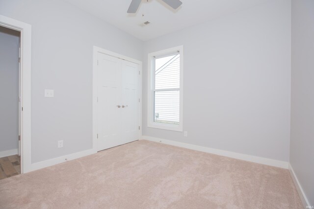5110 Mustang Dr, Evansville, IN 47715 - unfurnished bedroom featuring carpet floors, baseboards, and multiple windows