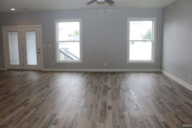 5110 Mustang Dr, Evansville, IN 47715 - unfurnished living room featuring dark wood-type flooring, baseboards, ceiling fan, and recessed lighting