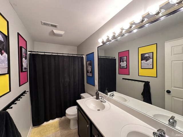 212 Alexandria Dr, Newburgh, IN 47630 - bathroom featuring toilet, double vanity, tile patterned floors, and a shower with curtain