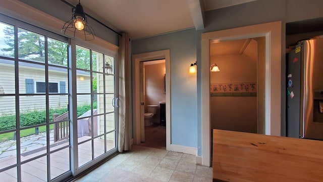 447 Englewood Ct, Fort Wayne, IN 46807 - doorway featuring healthy amount of natural light and baseboards